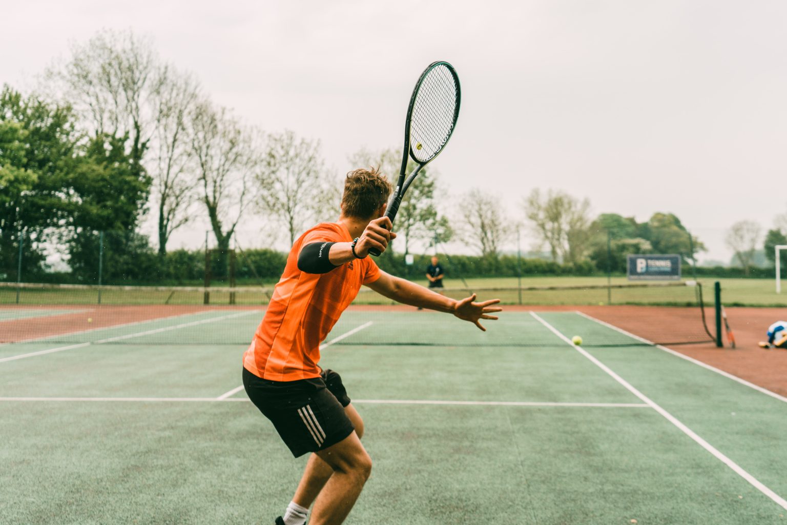World Tennis Day | Cynergi Health & Fitness | Male Playing Tennis