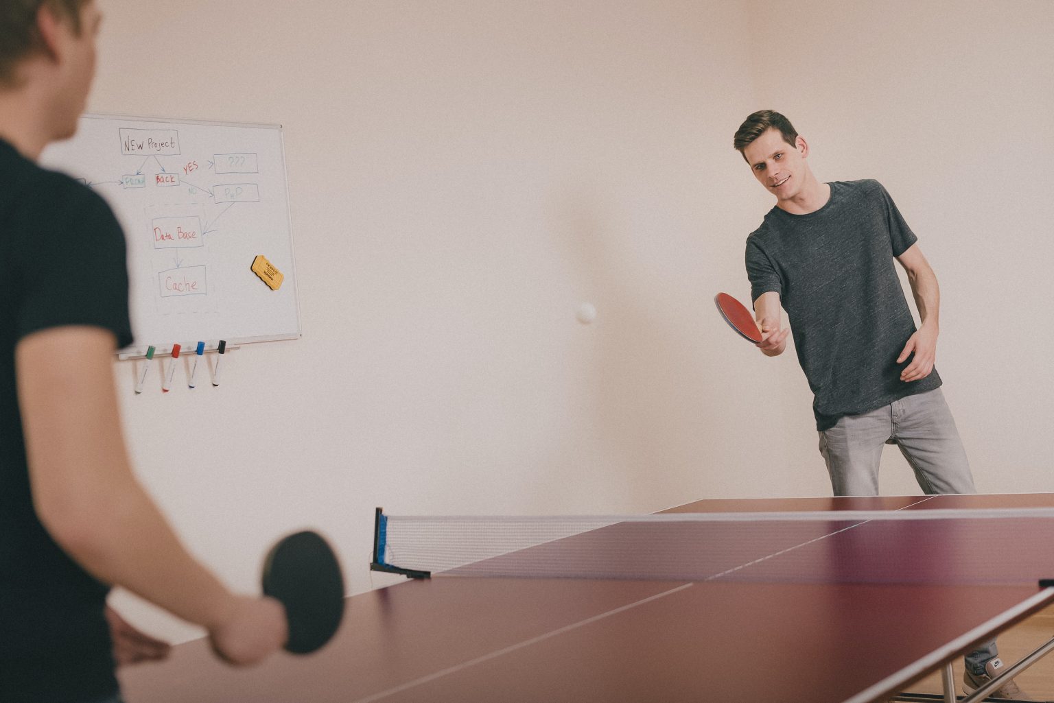 Table Tennis Tricks to Improve Your Skills | Cynergi Gym Malta | Friends Playing Table Tennis