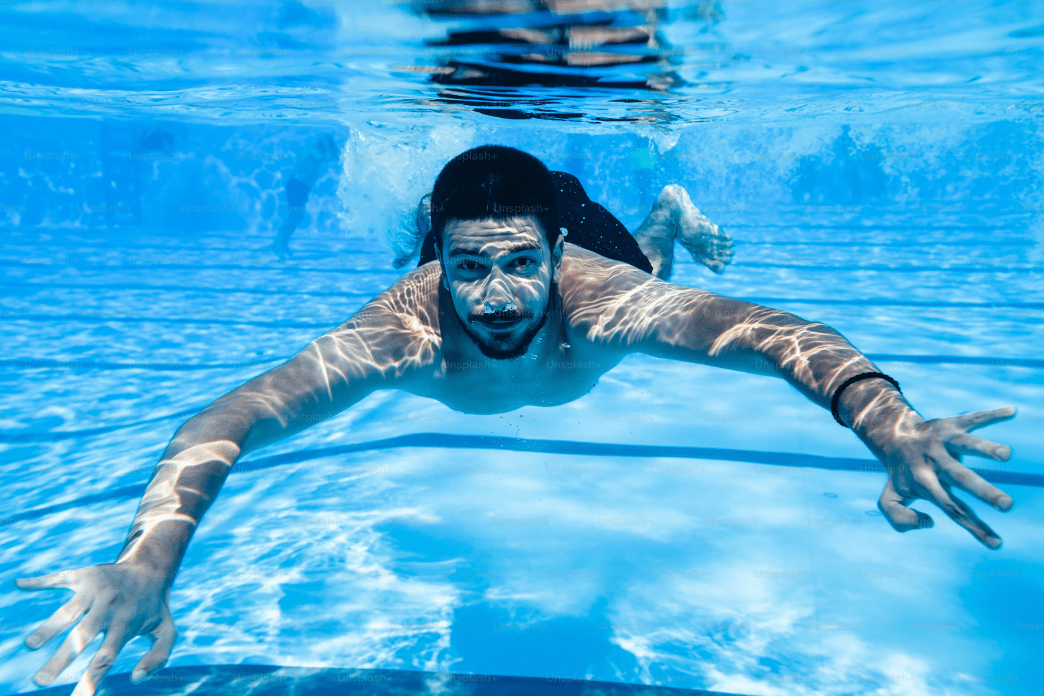 Swimming Workouts Dive Into Weight Loss and Tone Your Body | Cynergi Health and Fitness | Building up your breath